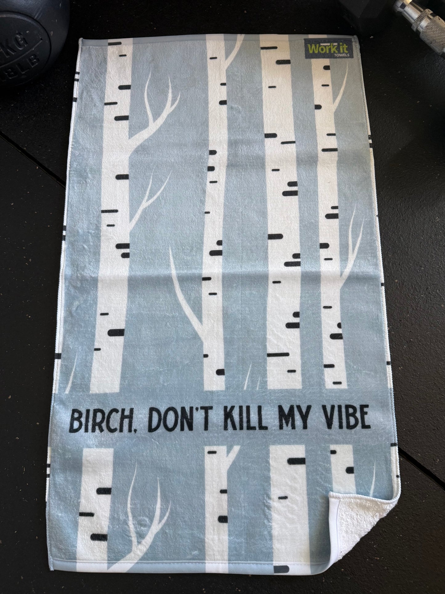 Fabric with birch tree pattern and text 'Birch. Don't kill my vibe' on a dark background