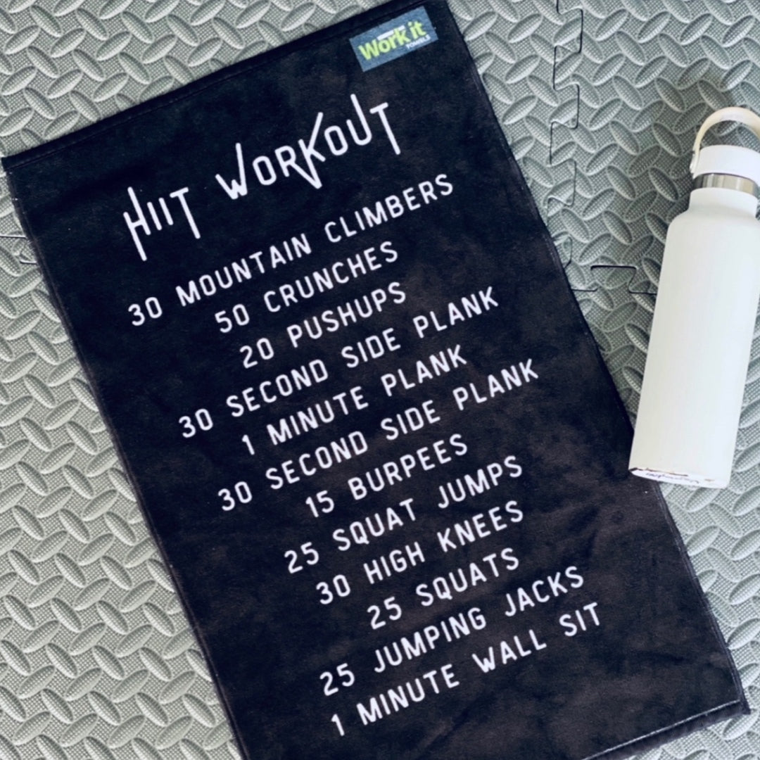 black gym towel with HIIT workout printed on the towel in white font