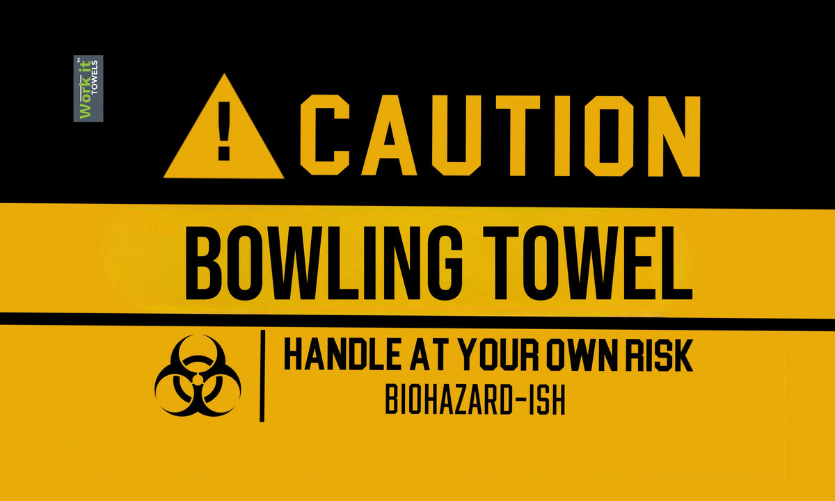 yellow and black caution towel design with 'caution bowling towel, handle at your own risk, biohazardish' 